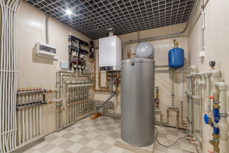 Hot water system inside room — Plumbing Contractors in Elimbah, QLD