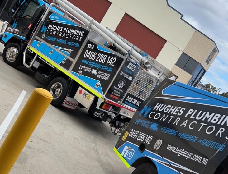 Plumbing service trucks — Plumbing Contractors in Brisbane, QLD