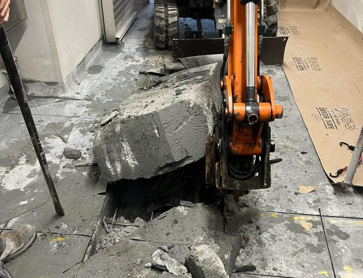 Excavator digs floor — Plumbing Contractors in Morayfield, QLD