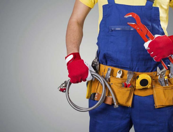 Plumber With A Yellow Tool Belt